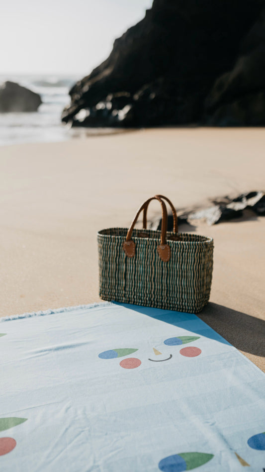 Familiar Faces Beach Towel